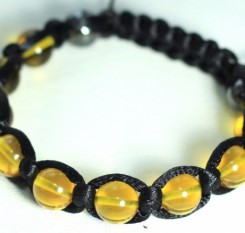 Браслет Shamballa із жовтого бурштину у нитці