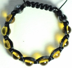 Браслет Shamballa із жовтого бурштину у нитці