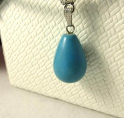 Кулон с бирюзой на кожаном шнуре