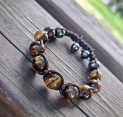 Грошовий браслет із тигрового ока у коричневій шкірі