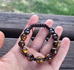 Грошовий браслет із тигрового ока у коричневій шкірі