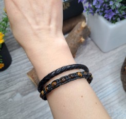 Браслет у плетеній шкірі із тигрового ока на благополуччя